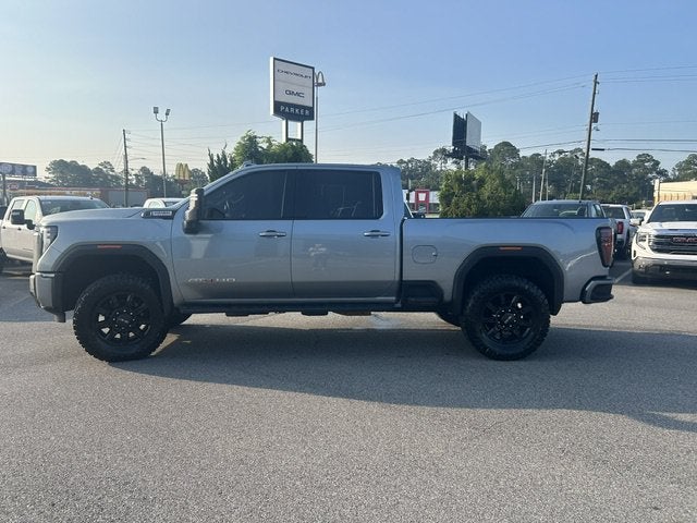 2024 GMC Sierra 2500 HD AT4 in Sterling Metallic — front three-quarter view