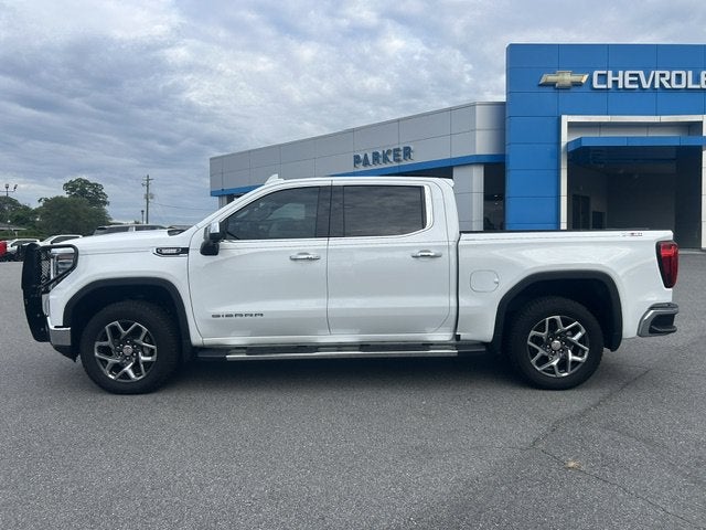 2023 GMC Sierra 1500 SLT in Summit White — front three-quarter view